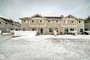 Snow covered house with a chimney - 185 230 Edwards Drive, Edmonton, AB  - Outdoor 