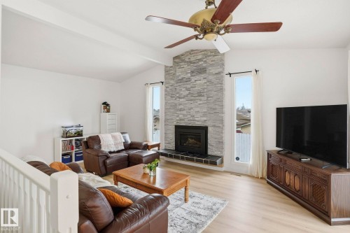 10703 31 Street, Edmonton, AB - Indoor Photo Showing Living Room With Fireplace