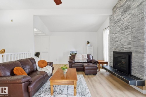 10703 31 Street, Edmonton, AB - Indoor Photo Showing Living Room With Fireplace