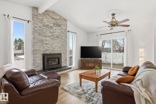 10703 31 Street, Edmonton, AB - Indoor Photo Showing Living Room With Fireplace