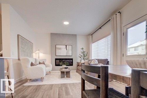 4178 Kinglet Drive, Edmonton, AB - Indoor Photo Showing Living Room With Fireplace