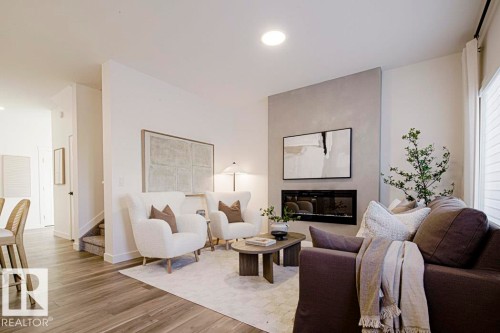 4178 Kinglet Drive, Edmonton, AB - Indoor Photo Showing Living Room With Fireplace