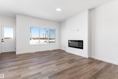 19312 29 Avenue, Edmonton, AB - Indoor Photo Showing Living Room With Fireplace