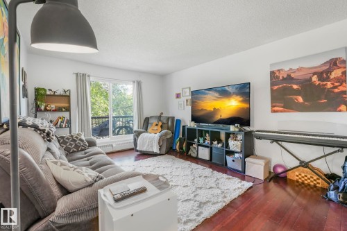 309 10636 120 Street, Edmonton, AB - Indoor Photo Showing Living Room