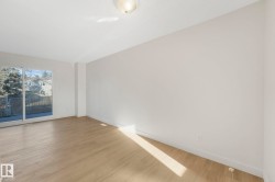 Empty room featuring light wood-style floors - 