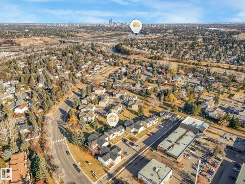 Aerial view of property and surrounding area featuring nearby suburban area - 5833 Riverbend Road, Edmonton, AB - Outdoor With View