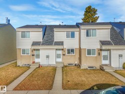 Traditional-style home with a shingled roof and entry steps - 