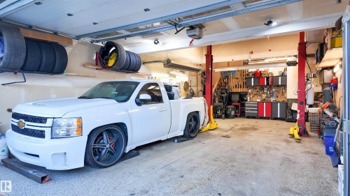 Garage with a garage door opener - 10 Moberg Close, Leduc, AB - Indoor Photo Showing Garage