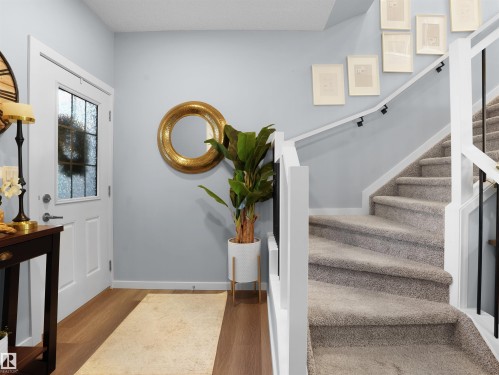 Entrance foyer featuring wood finished floors - 207 41 Avenue, Edmonton, AB - Indoor Photo Showing Other Room