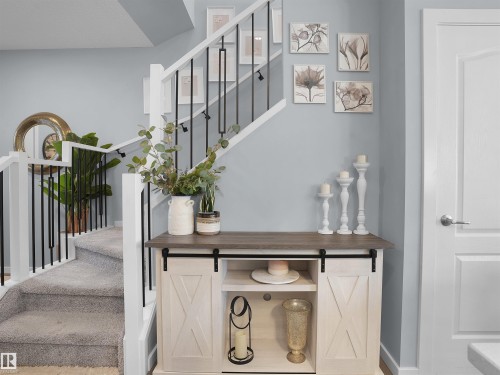 Staircase with baseboards - 207 41 Avenue, Edmonton, AB - Indoor Photo Showing Other Room