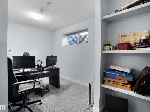 Office featuring light carpet and a textured ceiling - 207 41 Avenue, Edmonton, AB - Indoor Photo Showing Office