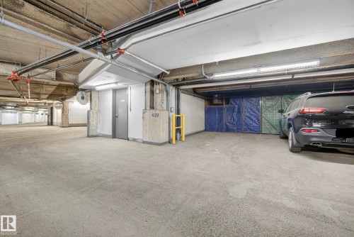 201 5151 Windermere Boulevard, Edmonton, AB - Indoor Photo Showing Garage