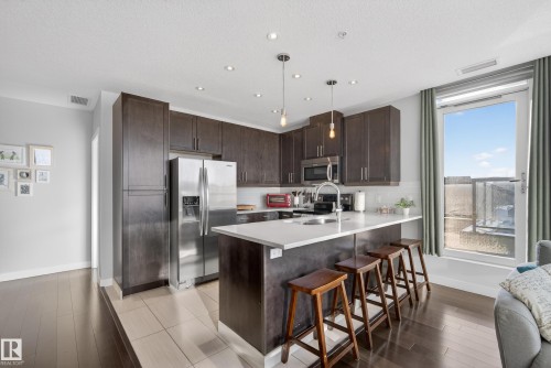 201 5151 Windermere Boulevard, Edmonton, AB - Indoor Photo Showing Kitchen With Upgraded Kitchen