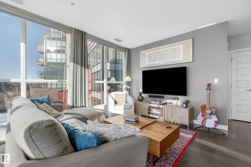 201 5151 Windermere Boulevard, Edmonton, AB - Indoor Photo Showing Living Room