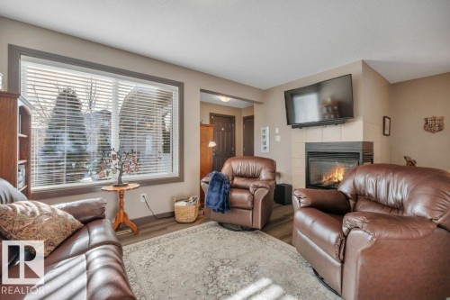497 Chappelle Drive, Edmonton, AB - Indoor Photo Showing Living Room With Fireplace