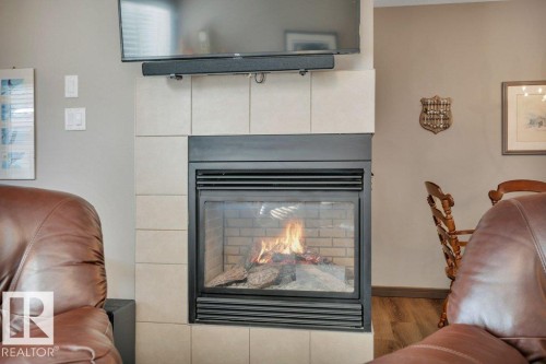 497 Chappelle Drive, Edmonton, AB - Indoor Photo Showing Living Room With Fireplace