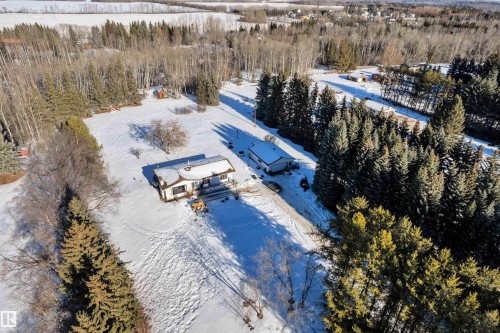 Snowy aerial view featuring a view of trees - 20920 9 Avenue, Edmonton, AB - Outdoor With View