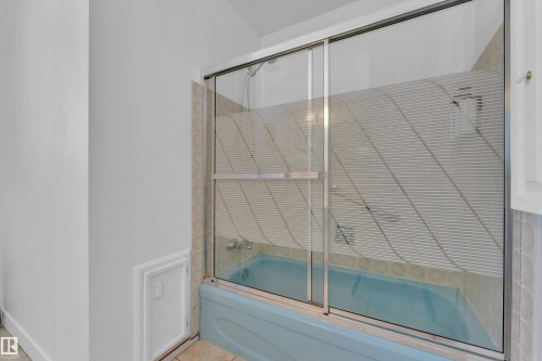 Bathroom featuring enclosed tub / shower combo - 20920 9 Avenue, Edmonton, AB - Indoor Photo Showing Bathroom
