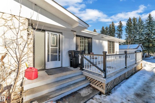 Entrance to property with a deck - 20920 9 Avenue, Edmonton, AB - Outdoor With Deck Patio Veranda With Exterior