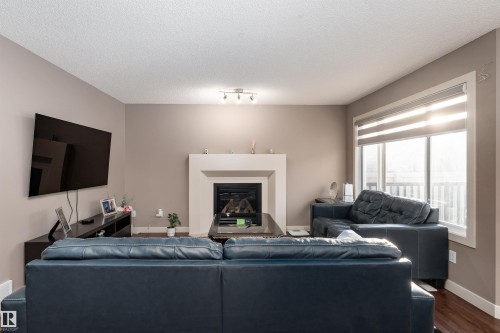 6811 19 Avenue, Edmonton, AB - Indoor Photo Showing Living Room With Fireplace
