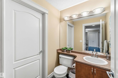 Bathroom featuring vanity and a textured ceiling - 11715 167A Avenue, Edmonton, AB - Indoor Photo Showing Bathroom
