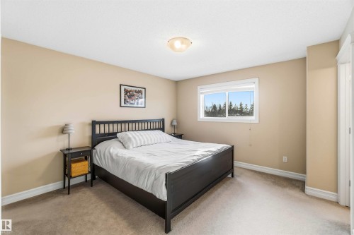 Bedroom featuring carpet floors - 11715 167A Avenue, Edmonton, AB - Indoor Photo Showing Bedroom