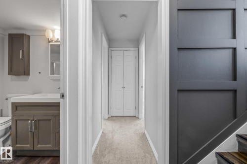 Hall featuring baseboards - 14911 96 Street, Edmonton, AB - Indoor Photo Showing Other Room