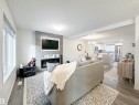1270 Rosenthal Boulevard, Edmonton, AB  - Indoor Photo Showing Living Room With Fireplace 