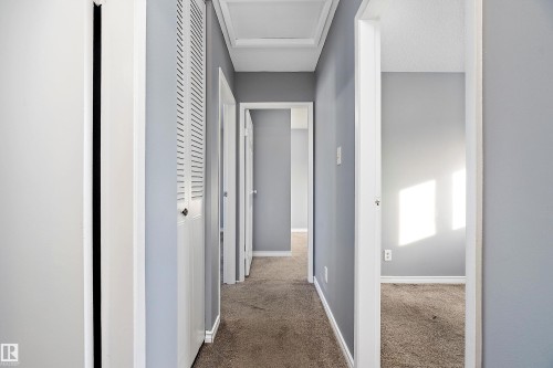 Corridor featuring carpet flooring - 15C Callingwood Crest, Edmonton, AB - Indoor Photo Showing Other Room