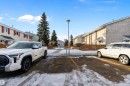 View of street featuring a residential view and street lights - 15C Callingwood Crest, Edmonton, AB  -  