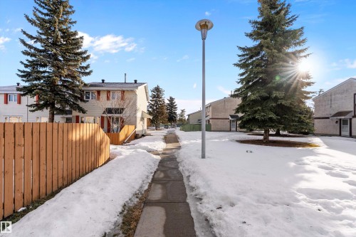 View of road featuring street lights and a residential view - 15C Callingwood Crest, Edmonton, AB - Outdoor
