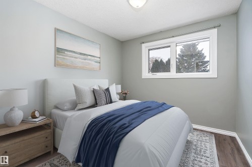 10 Wild Hay Drive, Devon, AB - Indoor Photo Showing Bedroom