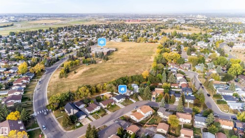 Backing onto Menisa Elementary School and Park. - 7115 12 Avenue, Edmonton, AB - Outdoor With View