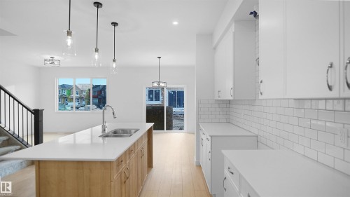 4715 Kinney Road, Edmonton, AB - Indoor Photo Showing Kitchen With Double Sink With Upgraded Kitchen