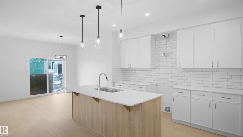 4715 Kinney Road, Edmonton, AB - Indoor Photo Showing Kitchen With Double Sink With Upgraded Kitchen