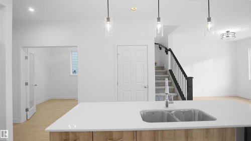 4715 Kinney Road, Edmonton, AB - Indoor Photo Showing Kitchen With Double Sink