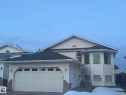 View of front of house with a garage, roof with shingles, and driveway - 3011 37 Street Nw, Edmonton, AB  - Outdoor 