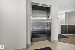 Elevator with carpet and baseboards - 
