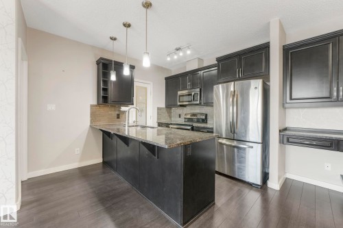 414 507 Albany Way, Edmonton, AB - Indoor Photo Showing Kitchen With Stainless Steel Kitchen With Upgraded Kitchen