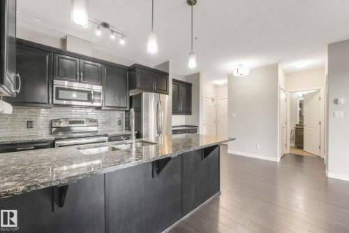 414 507 Albany Way, Edmonton, AB - Indoor Photo Showing Kitchen With Stainless Steel Kitchen With Upgraded Kitchen