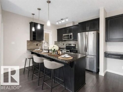 414 507 Albany Way, Edmonton, AB - Indoor Photo Showing Kitchen With Stainless Steel Kitchen With Upgraded Kitchen