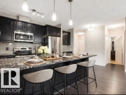 414 507 Albany Way, Edmonton, AB - Indoor Photo Showing Kitchen With Stainless Steel Kitchen With Upgraded Kitchen