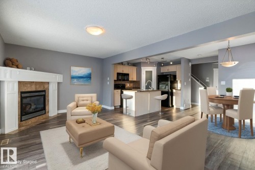 1119 37B Avenue, Edmonton, AB - Indoor Photo Showing Living Room With Fireplace