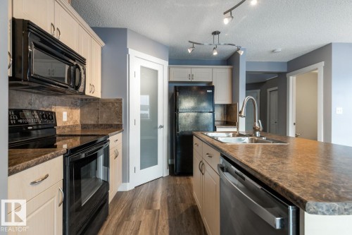 1119 37B Avenue, Edmonton, AB - Indoor Photo Showing Kitchen With Double Sink