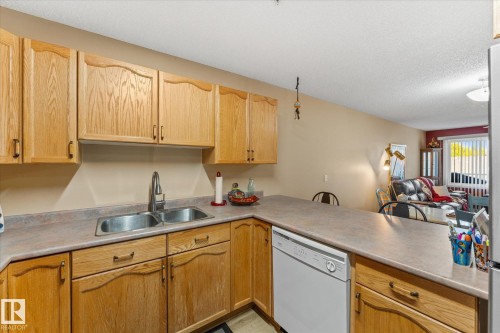 203 160 Kingswood Boulevard, St. Albert, AB - Indoor Photo Showing Kitchen With Double Sink