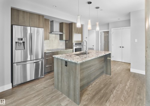 502 11969 Jasper Avenue, Edmonton, AB - Indoor Photo Showing Kitchen With Stainless Steel Kitchen With Upgraded Kitchen