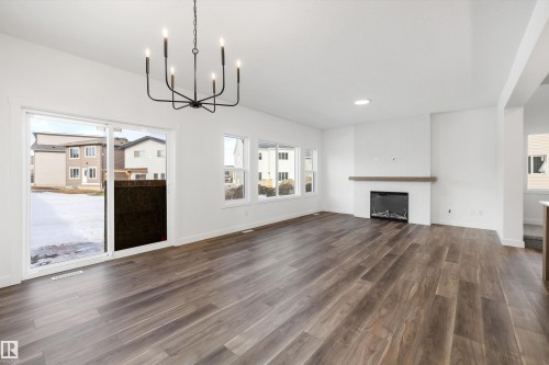 19428 25 Avenue, Edmonton, AB - Indoor Photo Showing Living Room With Fireplace
