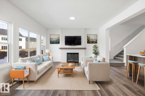 19428 25 Avenue, Edmonton, AB - Indoor Photo Showing Living Room With Fireplace