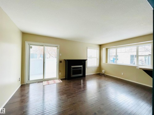 78 230 Edwards Drive, Edmonton, AB - Indoor Photo Showing Living Room With Fireplace