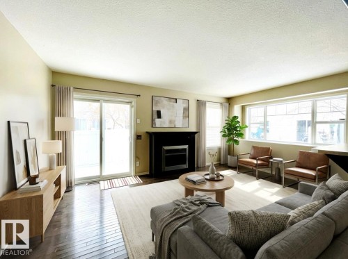 Virtually staged. - 78 230 Edwards Drive, Edmonton, AB - Indoor Photo Showing Living Room With Fireplace